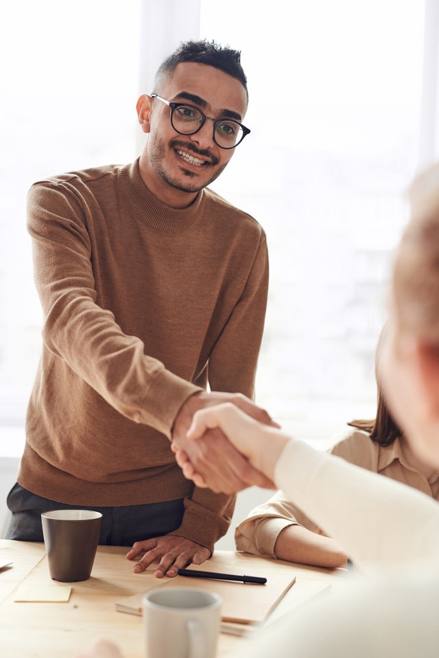 photo-of-man-wearing-brown-sweater-3184603